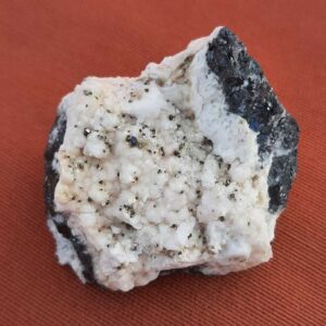 Mangano calciet met Sfaleriet